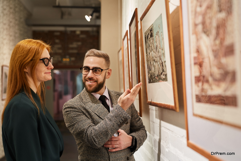 woman looking at the art