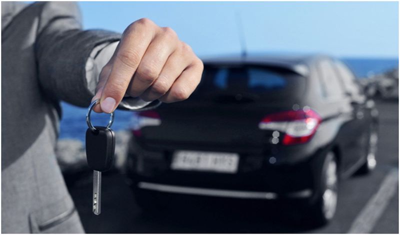 person showing car keys